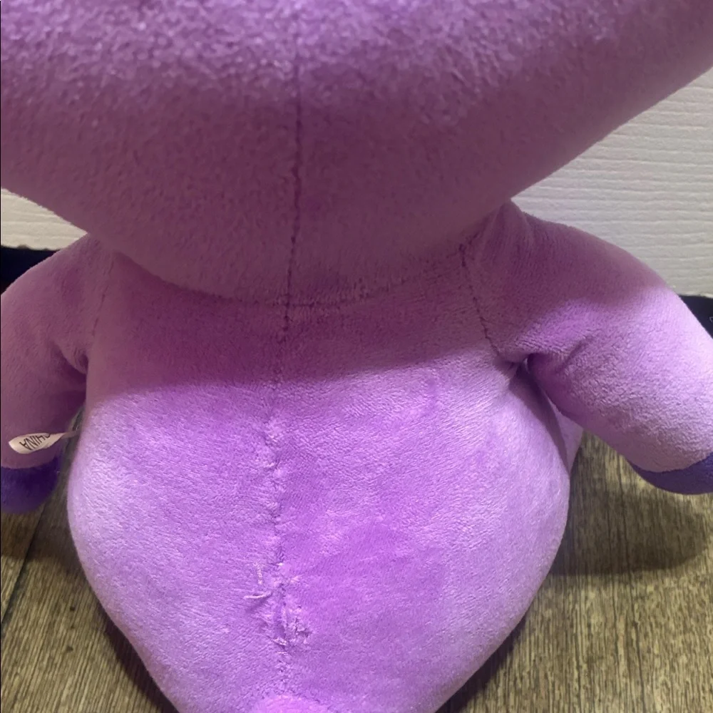 Purple Cat Plush Toy with Black Accents